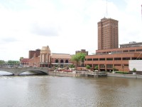 The Fox River and Galena Boulevard dam, Paramount Theatre, Aurora Riverwalk, Civic Center, and Leland Tower