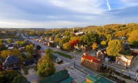 Early morning sun lights up the fall colors down Market Street in Hermann, Missouri